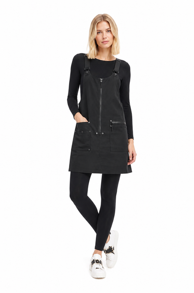 Model wearing the BLACKPANTS Essential Layering Top underneath the BLACKPANTS Industrial Pinny, showcasing its streamlined fit and layering versatility.