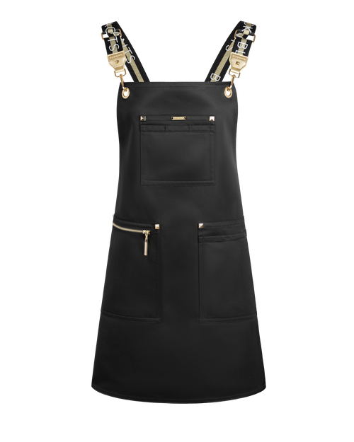 A black bib apron with gold-tone hardware, featuring a central chest pocket, two lower front pockets with gold zipper pulls, and adjustable shoulder straps with gold metal clasps, shown on a plain white background.