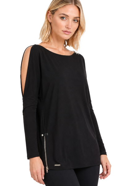Model wearing the BLACKPANTS Open Shoulder Drape Top in black, featuring a boat neckline, cold shoulder detail, long sleeves and side zip accent.