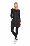 Model wearing the BLACKPANTS Essential Layering Top underneath the BLACKPANTS Industrial Pinny, showcasing its streamlined fit and layering versatility.