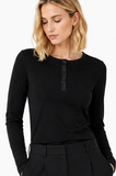 Close-up of BLACKPANTS Henley Top featuring dual neckline styling detail